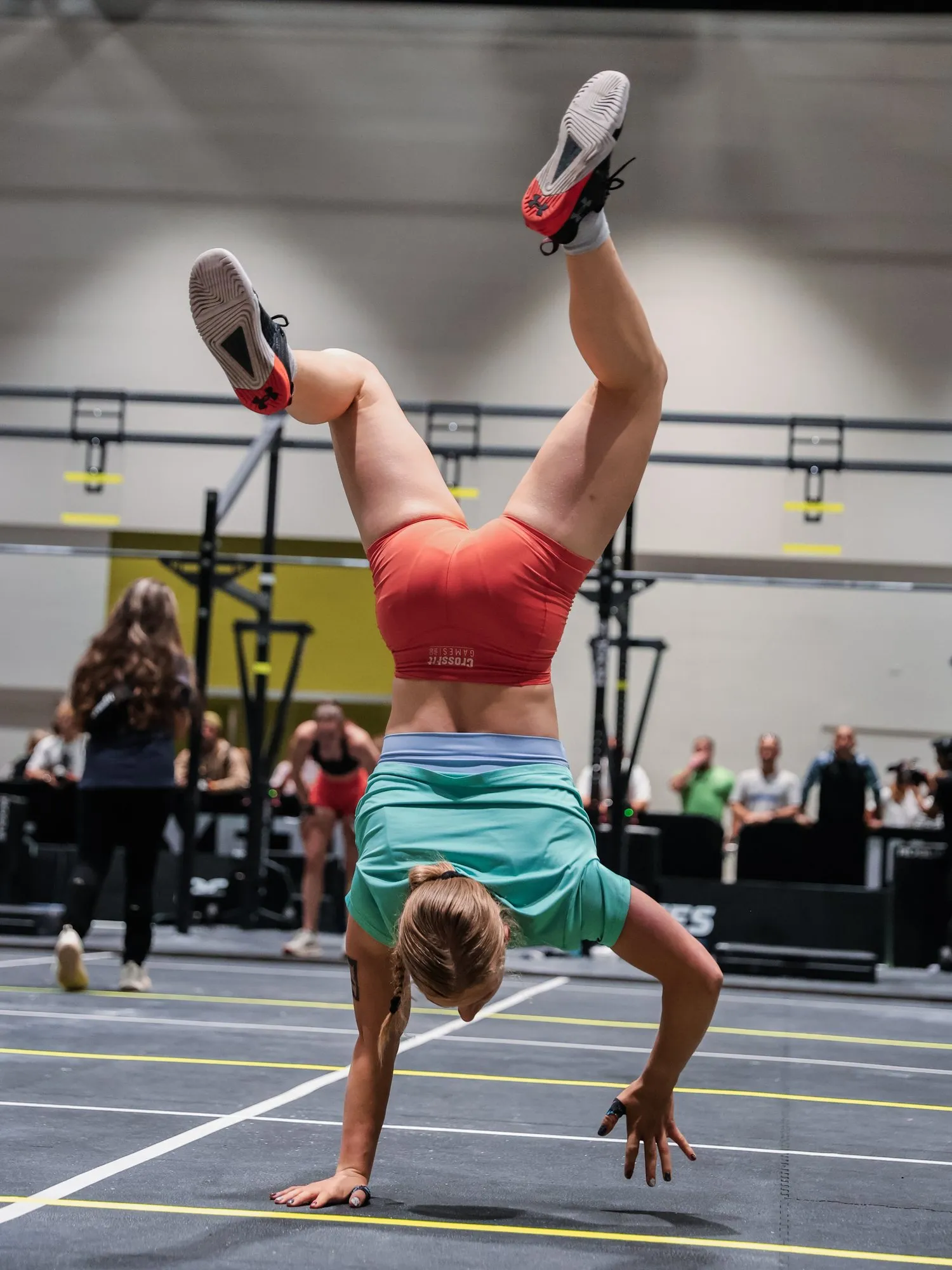Lucy mid handstand walk during Catalyst, Teen Games 2026