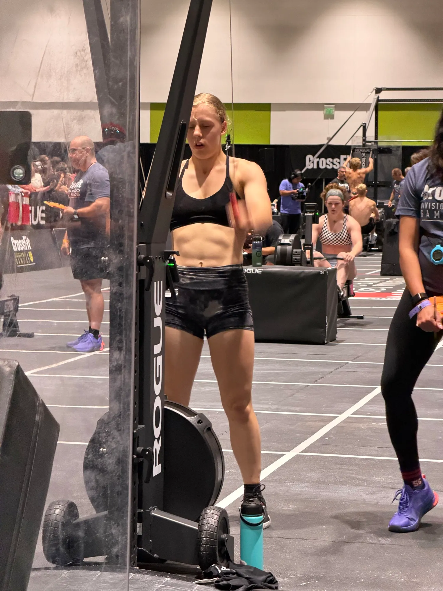 Lucy at the ski erg between efforts, Games 2026